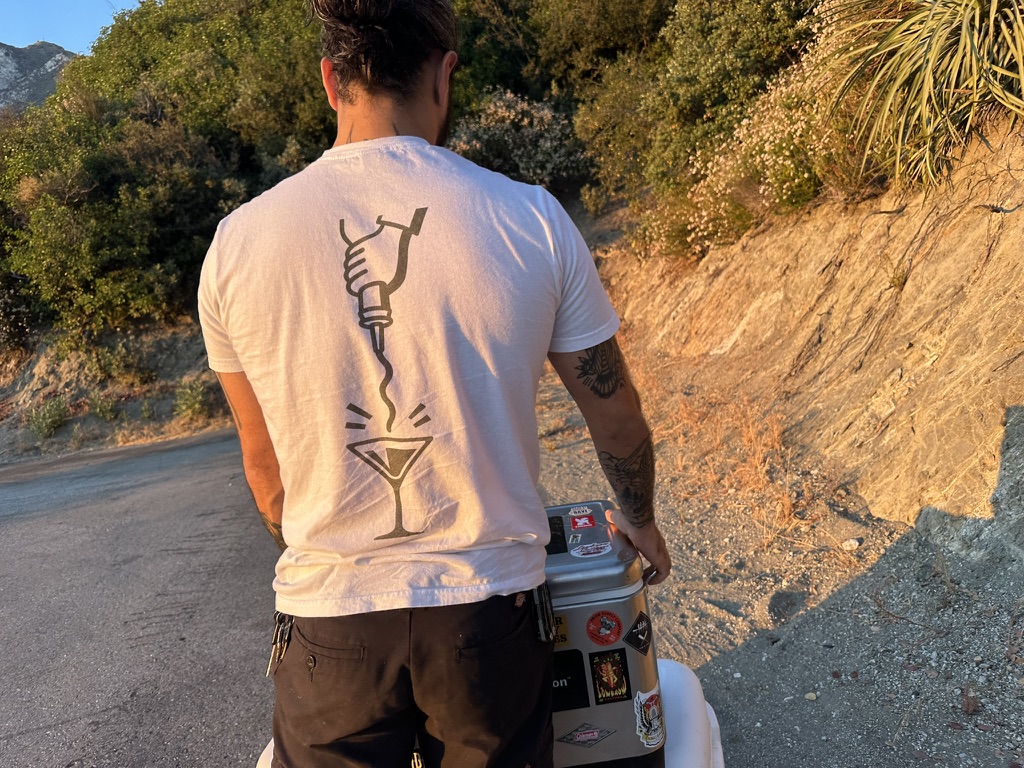Mike transporting bartending equipment outdoors