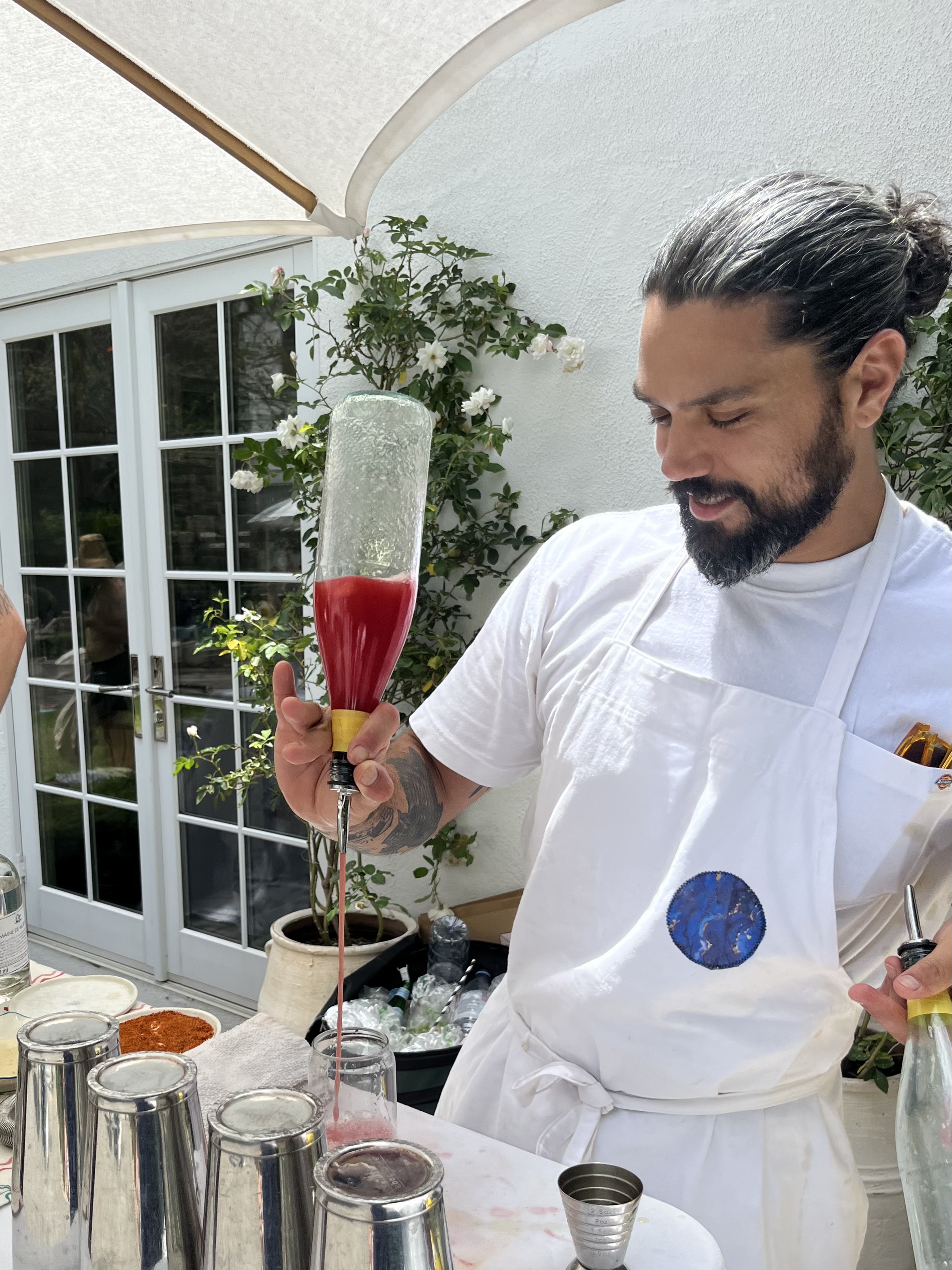 Mike preparing drinks at an event